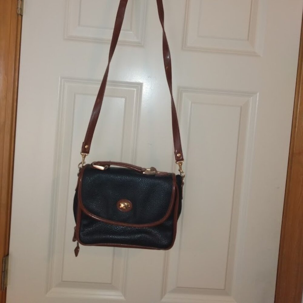 Style studio: Black & brown pebble grain cross body bag.